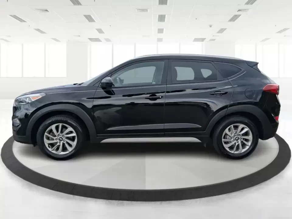 2018 Hyundai Tucson SEL (KM8J33A41JU) with an Nu 2L I-4 gasoline direct injection engine, 6A transmission, located at 880 E. National Road, Vandalia, OH, 45377, (937) 908-9800, 39.891918, -84.183594 - Picture your next week: an easy school drop-off, a smooth commute down US-35, and a weekend escape to Caesar Creek with enough room for coolers, strollers, or hiking gear. This 2018 Hyundai Tucson SEL is the kind of compact SUV that fits real life in Xenia-practical for growing families, comfortable - Photo#5