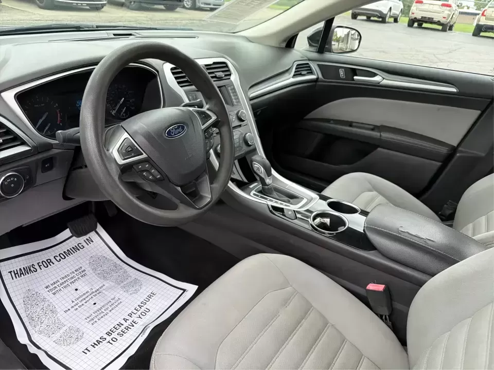 2014 Ford Fusion S (3FA6P0G78ER) with an Duratec 2.5L I-4 DOHC engine, Automatic transmission, located at 8750 N County Rd 25A, Piqua, OH, 45356, (937) 908-9800, 40.164391, -84.232513 - Are you on the hunt for a reliable sedan that fits seamlessly into your everyday life? Look no further than this stunning 2014 Ford Fusion S, available now at Advantage Car and Credit in Fairborn, OH. This vehicle is the perfect choice for budget-conscious buyers or families needing a dependable rid - Photo#9