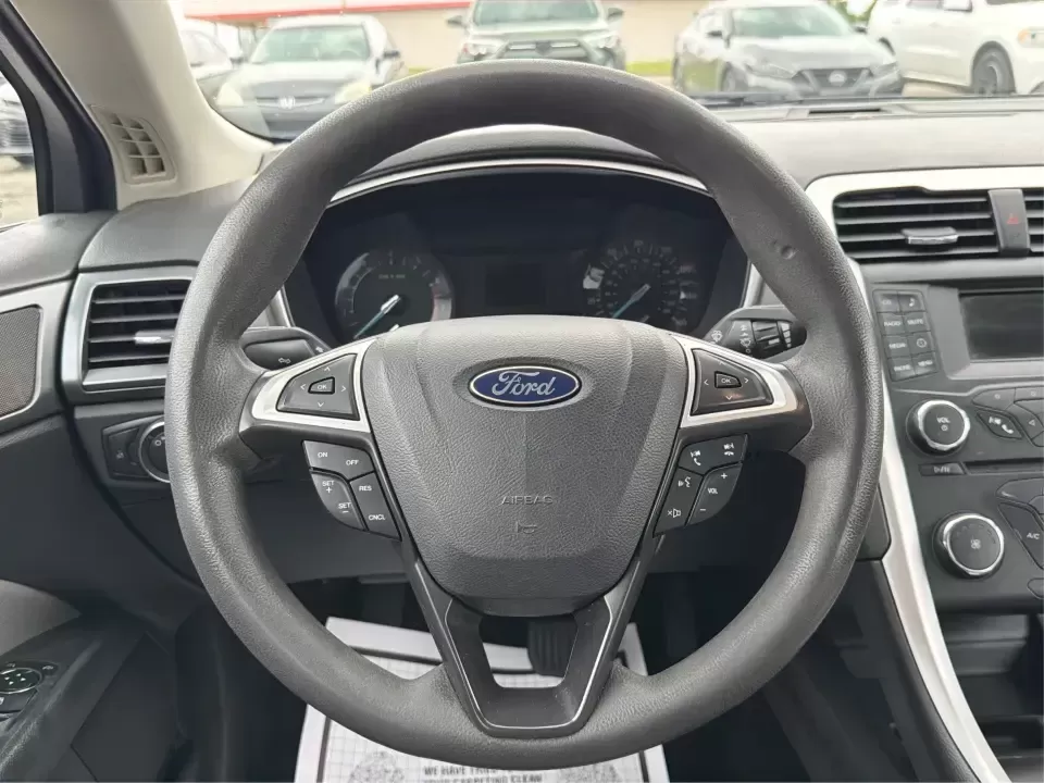 2014 Ford Fusion S (3FA6P0G78ER) with an Duratec 2.5L I-4 DOHC engine, Automatic transmission, located at 8750 N County Rd 25A, Piqua, OH, 45356, (937) 908-9800, 40.164391, -84.232513 - Are you on the hunt for a reliable sedan that fits seamlessly into your everyday life? Look no further than this stunning 2014 Ford Fusion S, available now at Advantage Car and Credit in Fairborn, OH. This vehicle is the perfect choice for budget-conscious buyers or families needing a dependable rid - Photo#16
