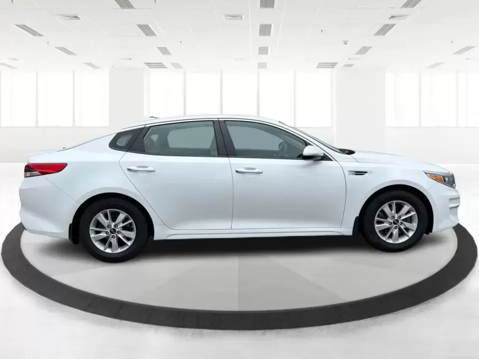 2016 Kia Optima LX (KNAGT4L36G5) with an Theta II 2.4L I-4 gasoline direct injection engine, 6A transmission, located at 401 Woodman Dr, Riverside, OH, 45431, (937) 908-9800, 39.760899, -84.123421 - Need a dependable sedan that can handle the weekday commute down I-675, quick school drop-offs near Mad River, and an easy weekend drive to Carillon Historical Park or a Dayton Dragons game? This 2016 Kia Optima LX in Snow White Pearl delivers the kind of practical comfort and modern tech that fits - Photo#1