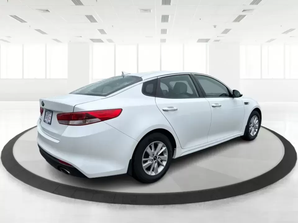 2016 Kia Optima LX (KNAGT4L36G5) with an Theta II 2.4L I-4 gasoline direct injection engine, 6A transmission, located at 401 Woodman Dr, Riverside, OH, 45431, (937) 908-9800, 39.760899, -84.123421 - Need a dependable sedan that can handle the weekday commute down I-675, quick school drop-offs near Mad River, and an easy weekend drive to Carillon Historical Park or a Dayton Dragons game? This 2016 Kia Optima LX in Snow White Pearl delivers the kind of practical comfort and modern tech that fits - Photo#2
