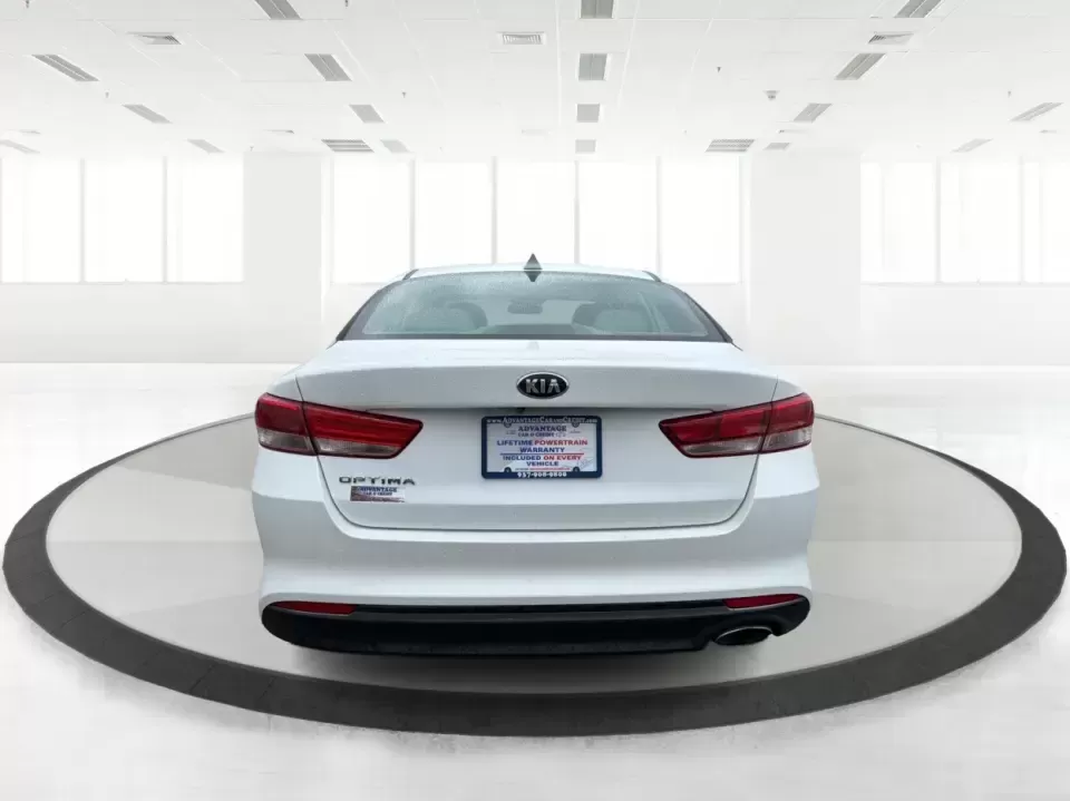 2016 Kia Optima LX (KNAGT4L36G5) with an Theta II 2.4L I-4 gasoline direct injection engine, 6A transmission, located at 401 Woodman Dr, Riverside, OH, 45431, (937) 908-9800, 39.760899, -84.123421 - Need a dependable sedan that can handle the weekday commute down I-675, quick school drop-offs near Mad River, and an easy weekend drive to Carillon Historical Park or a Dayton Dragons game? This 2016 Kia Optima LX in Snow White Pearl delivers the kind of practical comfort and modern tech that fits - Photo#3