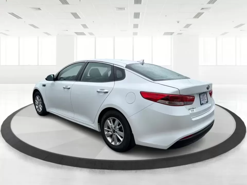 2016 Kia Optima LX (KNAGT4L36G5) with an Theta II 2.4L I-4 gasoline direct injection engine, 6A transmission, located at 401 Woodman Dr, Riverside, OH, 45431, (937) 908-9800, 39.760899, -84.123421 - Need a dependable sedan that can handle the weekday commute down I-675, quick school drop-offs near Mad River, and an easy weekend drive to Carillon Historical Park or a Dayton Dragons game? This 2016 Kia Optima LX in Snow White Pearl delivers the kind of practical comfort and modern tech that fits - Photo#4
