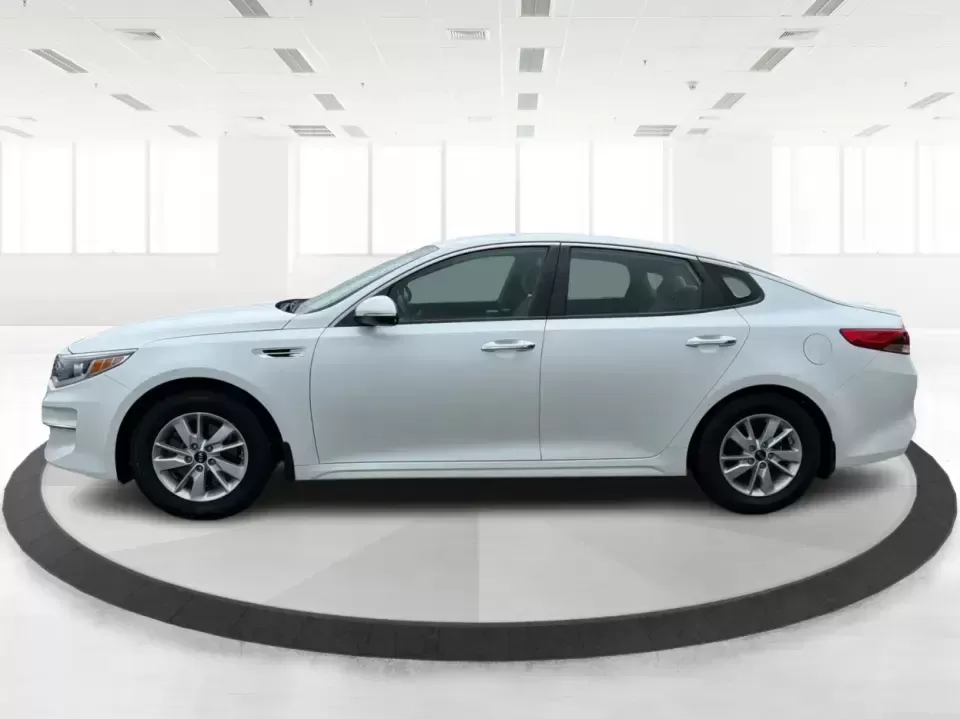 2016 Kia Optima LX (KNAGT4L36G5) with an Theta II 2.4L I-4 gasoline direct injection engine, 6A transmission, located at 401 Woodman Dr, Riverside, OH, 45431, (937) 908-9800, 39.760899, -84.123421 - Need a dependable sedan that can handle the weekday commute down I-675, quick school drop-offs near Mad River, and an easy weekend drive to Carillon Historical Park or a Dayton Dragons game? This 2016 Kia Optima LX in Snow White Pearl delivers the kind of practical comfort and modern tech that fits - Photo#5