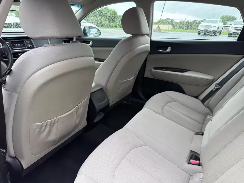 2016 Kia Optima LX (KNAGT4L36G5) with an Theta II 2.4L I-4 gasoline direct injection engine, 6A transmission, located at 401 Woodman Dr, Riverside, OH, 45431, (937) 908-9800, 39.760899, -84.123421 - Need a dependable sedan that can handle the weekday commute down I-675, quick school drop-offs near Mad River, and an easy weekend drive to Carillon Historical Park or a Dayton Dragons game? This 2016 Kia Optima LX in Snow White Pearl delivers the kind of practical comfort and modern tech that fits - Photo#10
