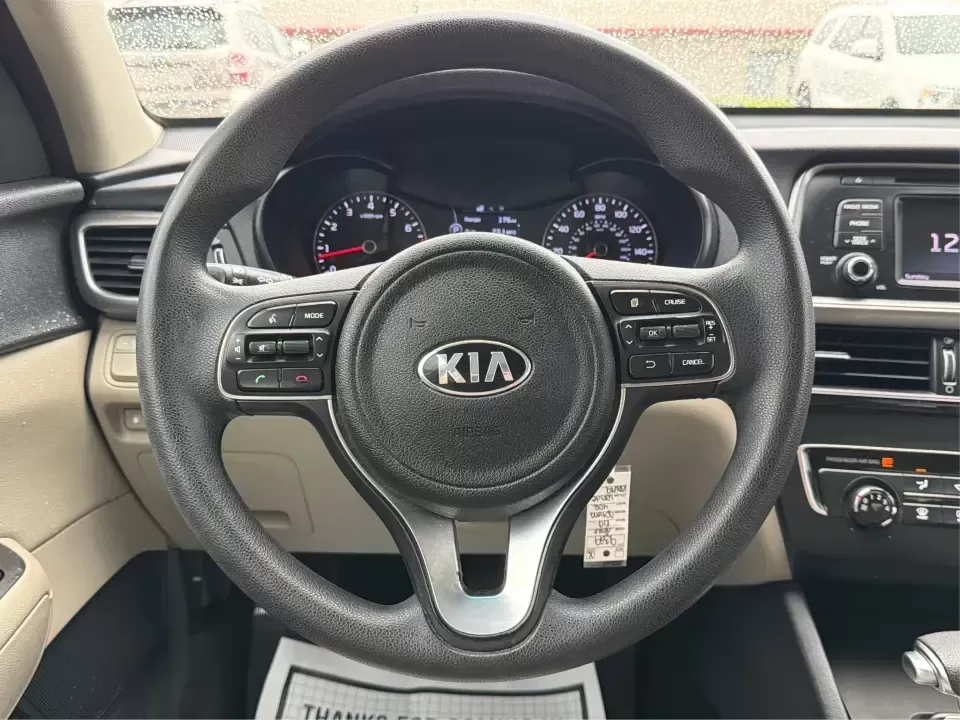 2016 Kia Optima LX (KNAGT4L36G5) with an Theta II 2.4L I-4 gasoline direct injection engine, 6A transmission, located at 401 Woodman Dr, Riverside, OH, 45431, (937) 908-9800, 39.760899, -84.123421 - Need a dependable sedan that can handle the weekday commute down I-675, quick school drop-offs near Mad River, and an easy weekend drive to Carillon Historical Park or a Dayton Dragons game? This 2016 Kia Optima LX in Snow White Pearl delivers the kind of practical comfort and modern tech that fits - Photo#16