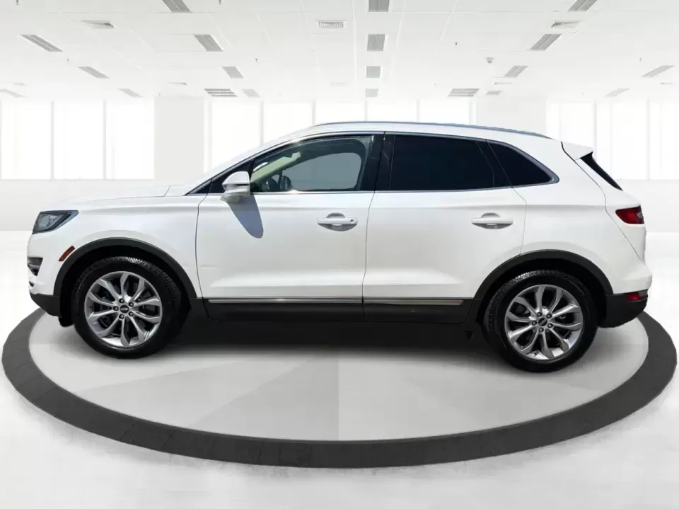 2015 Lincoln MKC Base (5LMTJ2AH4FU) with an 2.3L L4 DOHC 16V engine, 6-Speed Automatic transmission, located at 1230 East Main St, Xenia, OH, 45385, (937) 908-9800, 39.688026, -83.910172 - 2015 Lincoln MKC Base - Photo#5