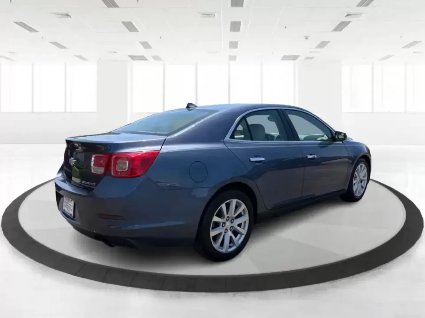 2014 Chevrolet Malibu 1TZ (1G11H5SL5EF) with an 2.5L L4 DOHC 16V engine, 6-Speed Automatic transmission, located at 401 Woodman Dr, Riverside, OH, 45431, (937) 908-9800, 39.760899, -84.123421 - Need a dependable sedan for the daily commute to Wright-Patterson AFB, quick errands down Woodman Dr, or comfortable weekend drives along I-675? This 2014 Chevrolet Malibu 1LZ in eye-catching Atlantis Blue Metallic fits real-life routines-school drop-offs, long commutes, and budget-friendly road tri - Photo#2