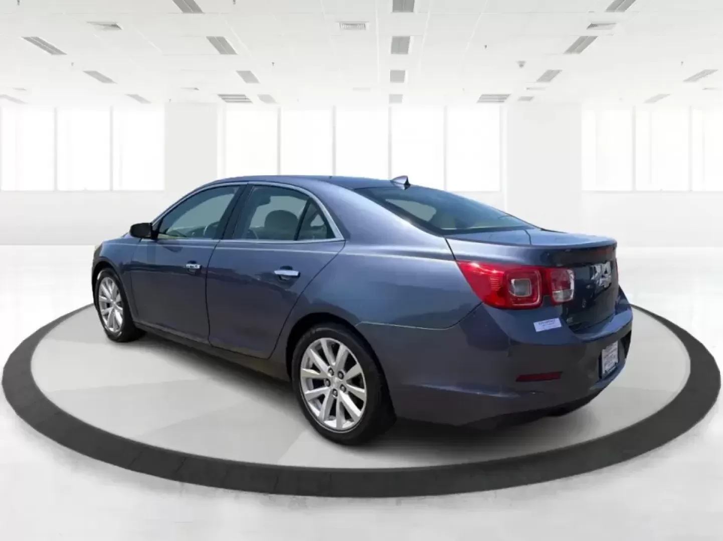 2014 Chevrolet Malibu 1TZ (1G11H5SL5EF) with an 2.5L L4 DOHC 16V engine, 6-Speed Automatic transmission, located at 401 Woodman Dr, Riverside, OH, 45431, (937) 908-9800, 39.760899, -84.123421 - Need a dependable sedan for the daily commute to Wright-Patterson AFB, quick errands down Woodman Dr, or comfortable weekend drives along I-675? This 2014 Chevrolet Malibu 1LZ in eye-catching Atlantis Blue Metallic fits real-life routines-school drop-offs, long commutes, and budget-friendly road tri - Photo#4