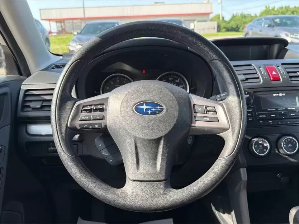2015 Subaru Forester 2.5i Premium (JF2SJADC8FH) with an 2.5L H-4 DOHC engine, 6-Speed Automatic transmission, located at 880 E. National Road, Vandalia, OH, 45377, (937) 908-9800, 39.891918, -84.183594 - 2015 Subaru Forester 2.5i Premium - Photo#15