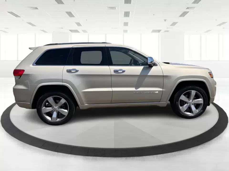 2014 Jeep Grand Cherokee Overland (1C4RJFCTXEC) with an 5.7L V8 OHV 16V engine, 5-Speed Automatic transmission, located at 1230 East Main St, Xenia, OH, 45385, (937) 908-9800, 39.688026, -83.910172 - Picture your next weekend: loading up for a road trip to Yellow Springs, cruising I675 with the family in comfort, or heading out to the trails and backroads around Wright-Patterson Air Force Base with the confidence of 4WD. This 2014 Jeep Grand Cherokee Overland is built for drivers who want a refi - Photo#1