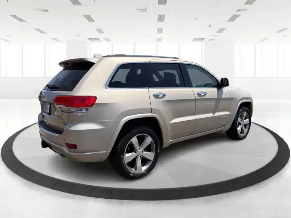 2014 Jeep Grand Cherokee Overland (1C4RJFCTXEC) with an 5.7L V8 OHV 16V engine, 5-Speed Automatic transmission, located at 1230 East Main St, Xenia, OH, 45385, (937) 908-9800, 39.688026, -83.910172 - Picture your next weekend: loading up for a road trip to Yellow Springs, cruising I675 with the family in comfort, or heading out to the trails and backroads around Wright-Patterson Air Force Base with the confidence of 4WD. This 2014 Jeep Grand Cherokee Overland is built for drivers who want a refi - Photo#2