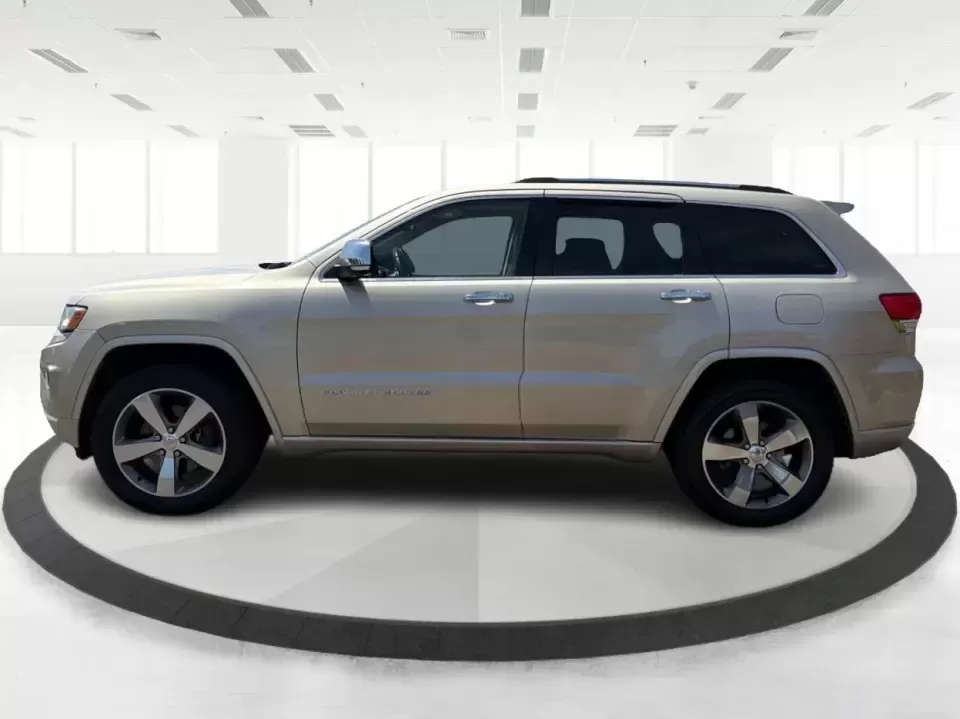 2014 Jeep Grand Cherokee Overland (1C4RJFCTXEC) with an 5.7L V8 OHV 16V engine, 5-Speed Automatic transmission, located at 1230 East Main St, Xenia, OH, 45385, (937) 908-9800, 39.688026, -83.910172 - Picture your next weekend: loading up for a road trip to Yellow Springs, cruising I675 with the family in comfort, or heading out to the trails and backroads around Wright-Patterson Air Force Base with the confidence of 4WD. This 2014 Jeep Grand Cherokee Overland is built for drivers who want a refi - Photo#5