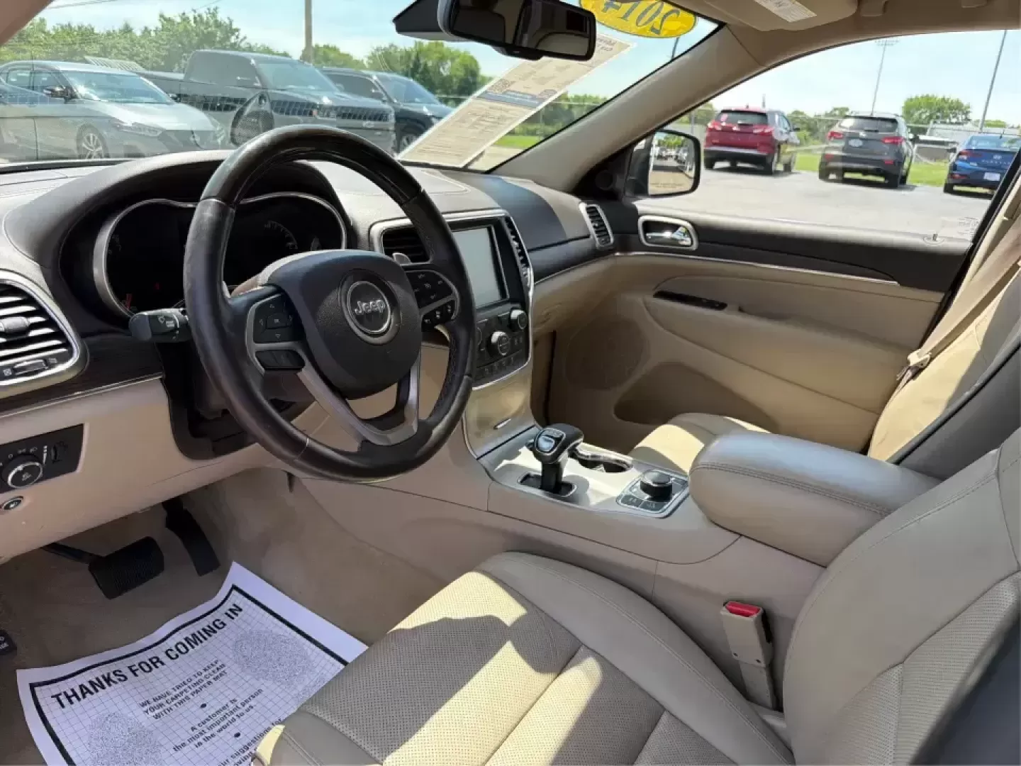 2014 Jeep Grand Cherokee Overland (1C4RJFCTXEC) with an 5.7L V8 OHV 16V engine, 5-Speed Automatic transmission, located at 1951 S Dayton Lakeview Rd., New Carlisle, OH, 45344, (937) 908-9800, 39.890999, -84.050255 - Picture your next weekend: loading up for a road trip to Yellow Springs, cruising I675 with the family in comfort, or heading out to the trails and backroads around Wright-Patterson Air Force Base with the confidence of 4WD. This 2014 Jeep Grand Cherokee Overland is built for drivers who want a refi - Photo#9