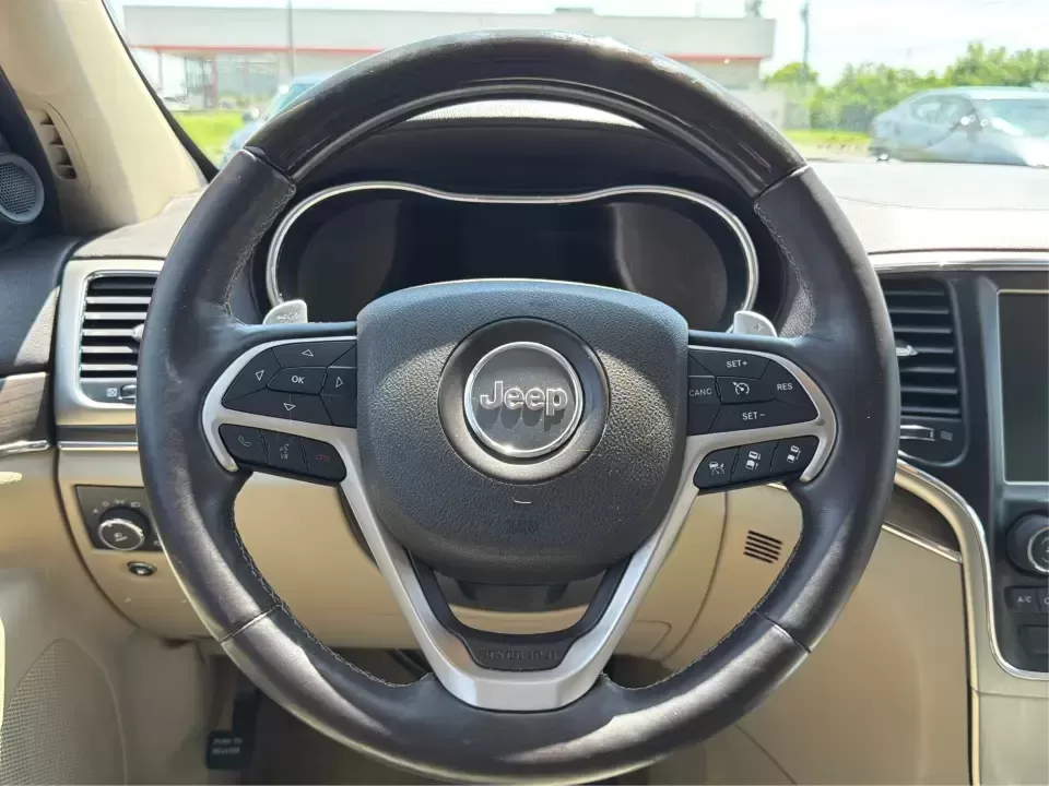 2014 Jeep Grand Cherokee Overland (1C4RJFCTXEC) with an 5.7L V8 OHV 16V engine, 5-Speed Automatic transmission, located at 1230 East Main St, Xenia, OH, 45385, (937) 908-9800, 39.688026, -83.910172 - Picture your next weekend: loading up for a road trip to Yellow Springs, cruising I675 with the family in comfort, or heading out to the trails and backroads around Wright-Patterson Air Force Base with the confidence of 4WD. This 2014 Jeep Grand Cherokee Overland is built for drivers who want a refi - Photo#16