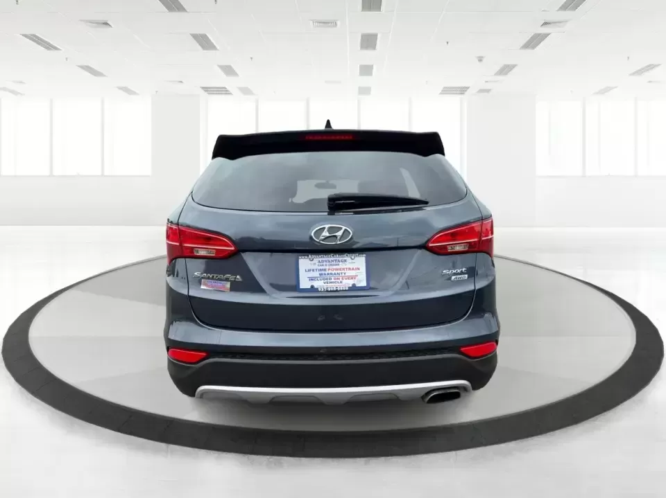 2015 Hyundai Santa Fe 2.4L (5XYZTDLB6FG) with an Theta II 2.4L I-4 gasoline direct injection engine, 6-Speed Automatic transmission, located at 401 Woodman Dr, Riverside, OH, 45431, (937) 908-9800, 39.760899, -84.123421 - Need one SUV that can handle school drop-offs, weekday commutes, and the occasional weekend escape to Eastwood MetroPark or a day trip down I-75? This 2015 Hyundai Santa Fe 2.4L in Mineral Gray fits that real-life rhythm with confident SUV versatility, family-friendly space, and comfort features tha - Photo#3