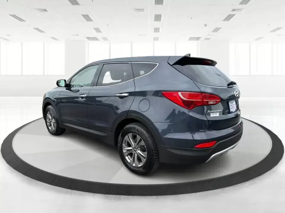 2015 Hyundai Santa Fe 2.4L (5XYZTDLB6FG) with an Theta II 2.4L I-4 gasoline direct injection engine, 6-Speed Automatic transmission, located at 401 Woodman Dr, Riverside, OH, 45431, (937) 908-9800, 39.760899, -84.123421 - Need one SUV that can handle school drop-offs, weekday commutes, and the occasional weekend escape to Eastwood MetroPark or a day trip down I-75? This 2015 Hyundai Santa Fe 2.4L in Mineral Gray fits that real-life rhythm with confident SUV versatility, family-friendly space, and comfort features tha - Photo#4