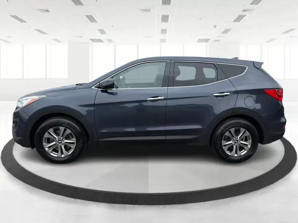 2015 Hyundai Santa Fe 2.4L (5XYZTDLB6FG) with an Theta II 2.4L I-4 gasoline direct injection engine, 6-Speed Automatic transmission, located at 401 Woodman Dr, Riverside, OH, 45431, (937) 908-9800, 39.760899, -84.123421 - Need one SUV that can handle school drop-offs, weekday commutes, and the occasional weekend escape to Eastwood MetroPark or a day trip down I-75? This 2015 Hyundai Santa Fe 2.4L in Mineral Gray fits that real-life rhythm with confident SUV versatility, family-friendly space, and comfort features tha - Photo#5
