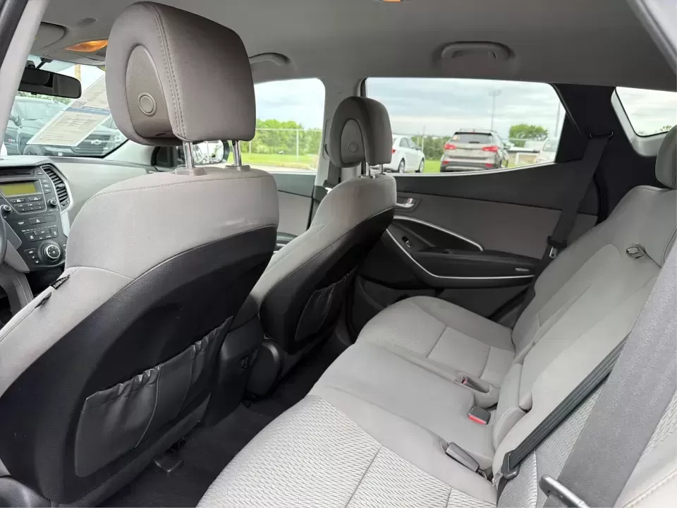 2015 Hyundai Santa Fe 2.4L (5XYZTDLB6FG) with an Theta II 2.4L I-4 gasoline direct injection engine, 6-Speed Automatic transmission, located at 401 Woodman Dr, Riverside, OH, 45431, (937) 908-9800, 39.760899, -84.123421 - Need one SUV that can handle school drop-offs, weekday commutes, and the occasional weekend escape to Eastwood MetroPark or a day trip down I-75? This 2015 Hyundai Santa Fe 2.4L in Mineral Gray fits that real-life rhythm with confident SUV versatility, family-friendly space, and comfort features tha - Photo#10