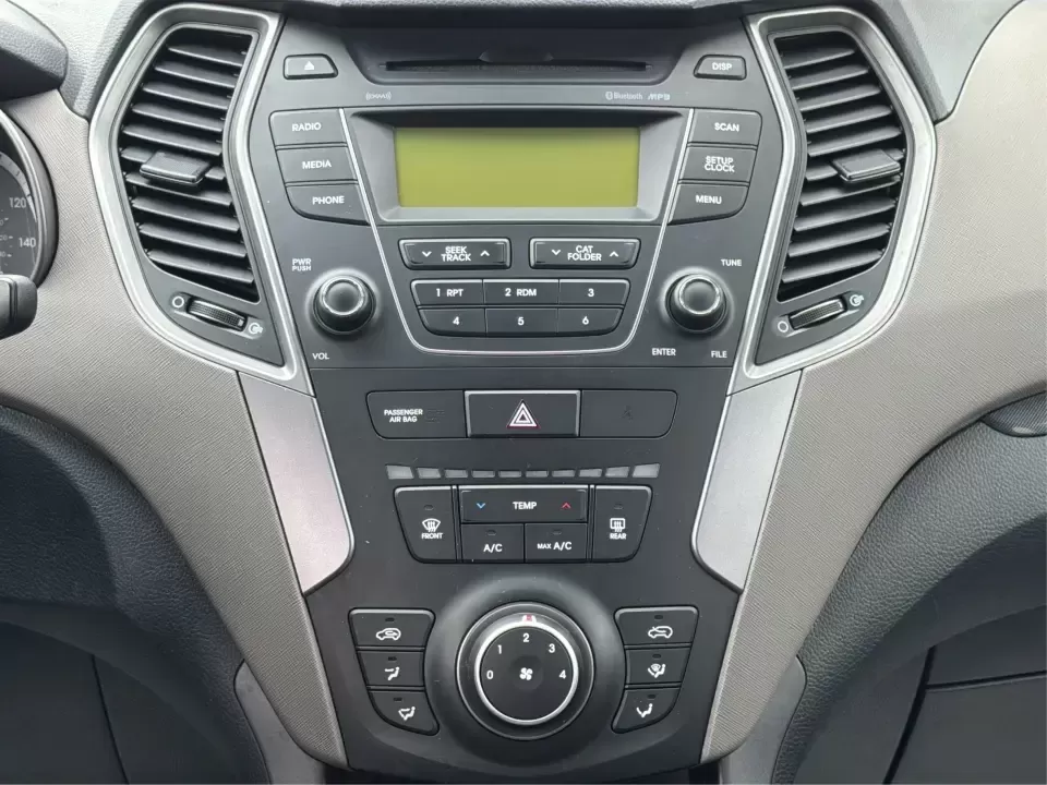 2015 Hyundai Santa Fe 2.4L (5XYZTDLB6FG) with an Theta II 2.4L I-4 gasoline direct injection engine, 6-Speed Automatic transmission, located at 401 Woodman Dr, Riverside, OH, 45431, (937) 908-9800, 39.760899, -84.123421 - Need one SUV that can handle school drop-offs, weekday commutes, and the occasional weekend escape to Eastwood MetroPark or a day trip down I-75? This 2015 Hyundai Santa Fe 2.4L in Mineral Gray fits that real-life rhythm with confident SUV versatility, family-friendly space, and comfort features tha - Photo#13