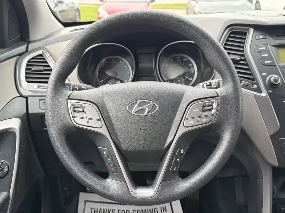 2015 Hyundai Santa Fe 2.4L (5XYZTDLB6FG) with an Theta II 2.4L I-4 gasoline direct injection engine, 6-Speed Automatic transmission, located at 401 Woodman Dr, Riverside, OH, 45431, (937) 908-9800, 39.760899, -84.123421 - Need one SUV that can handle school drop-offs, weekday commutes, and the occasional weekend escape to Eastwood MetroPark or a day trip down I-75? This 2015 Hyundai Santa Fe 2.4L in Mineral Gray fits that real-life rhythm with confident SUV versatility, family-friendly space, and comfort features tha - Photo#16