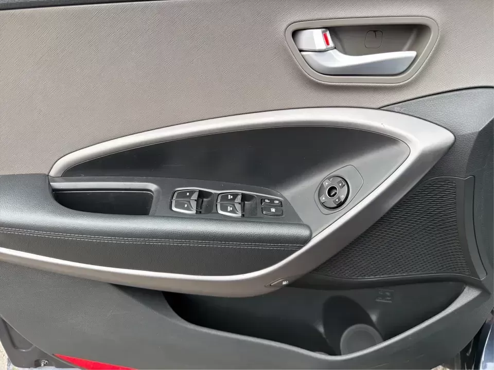 2015 Hyundai Santa Fe 2.4L (5XYZTDLB6FG) with an Theta II 2.4L I-4 gasoline direct injection engine, 6-Speed Automatic transmission, located at 401 Woodman Dr, Riverside, OH, 45431, (937) 908-9800, 39.760899, -84.123421 - Need one SUV that can handle school drop-offs, weekday commutes, and the occasional weekend escape to Eastwood MetroPark or a day trip down I-75? This 2015 Hyundai Santa Fe 2.4L in Mineral Gray fits that real-life rhythm with confident SUV versatility, family-friendly space, and comfort features tha - Photo#17