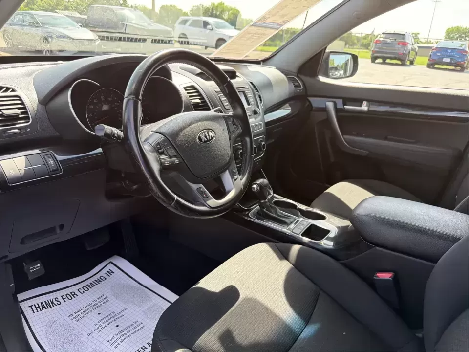 2014 Kia Sorento LX (5XYKT3A68EG) with an 2.4L I-4 gasoline direct injection engine, 6-Speed Automatic transmission, located at 1099 N County Rd 25A , Troy, OH, 45373, (937) 908-9800, 40.057079, -84.212883 - Need an SUV that fits real life in Troy-school drop-offs, a long commute down I-75, and weekend runs to Charleston Falls Preserve or a day around Downtown Troy? This 2014 Kia Sorento LX in Ebony Black is a practical, road-trip-ready SUV that balances everyday comfort with the kind of space and versa - Photo#9