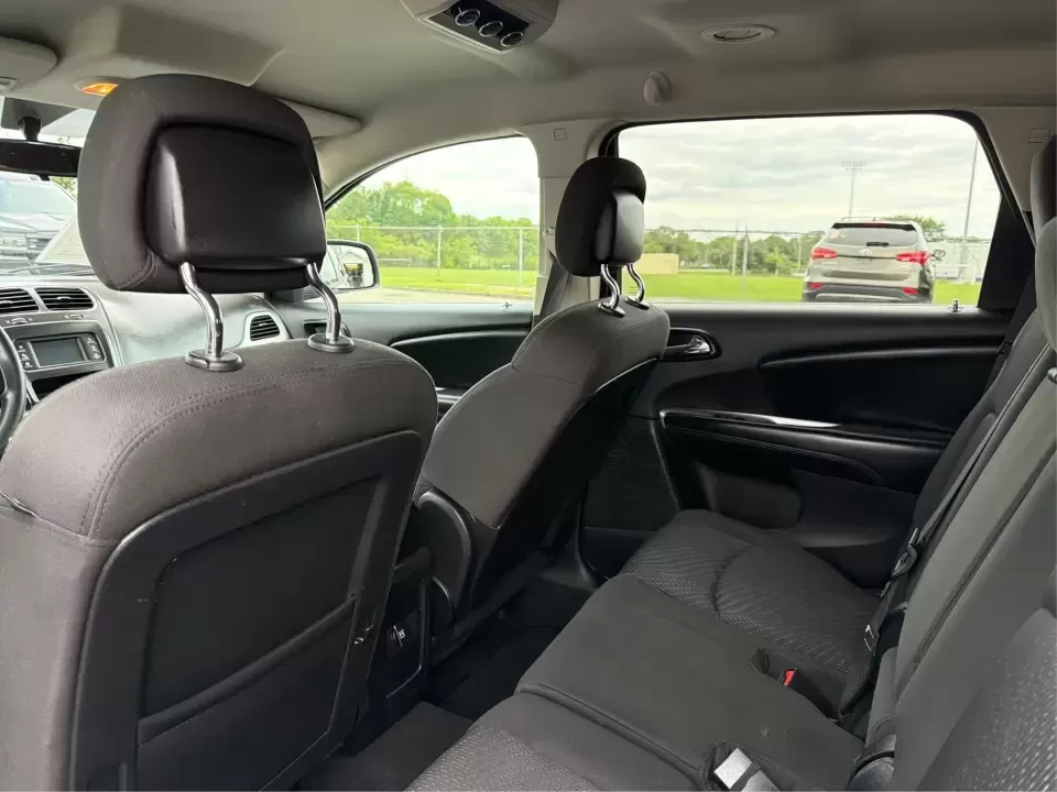 2017 Dodge Journey SXT AWD (3C4PDDBG4HT) with an Pentastar 3.6L V-6 DOHC engine, 6A transmission, located at 1099 N County Rd 25A , Troy, OH, 45373, (937) 908-9800, 40.057079, -84.212883 - Pack up the kids, cue up a playlist, and point your next weekend escape toward the open roads around Miami County-this 2017 Dodge Journey SXT AWD is the kind of SUV that fits real life. Whether you're shuttling to practice, commuting to Dayton, or planning a road trip up I75, the Journey's three-row - Photo#10