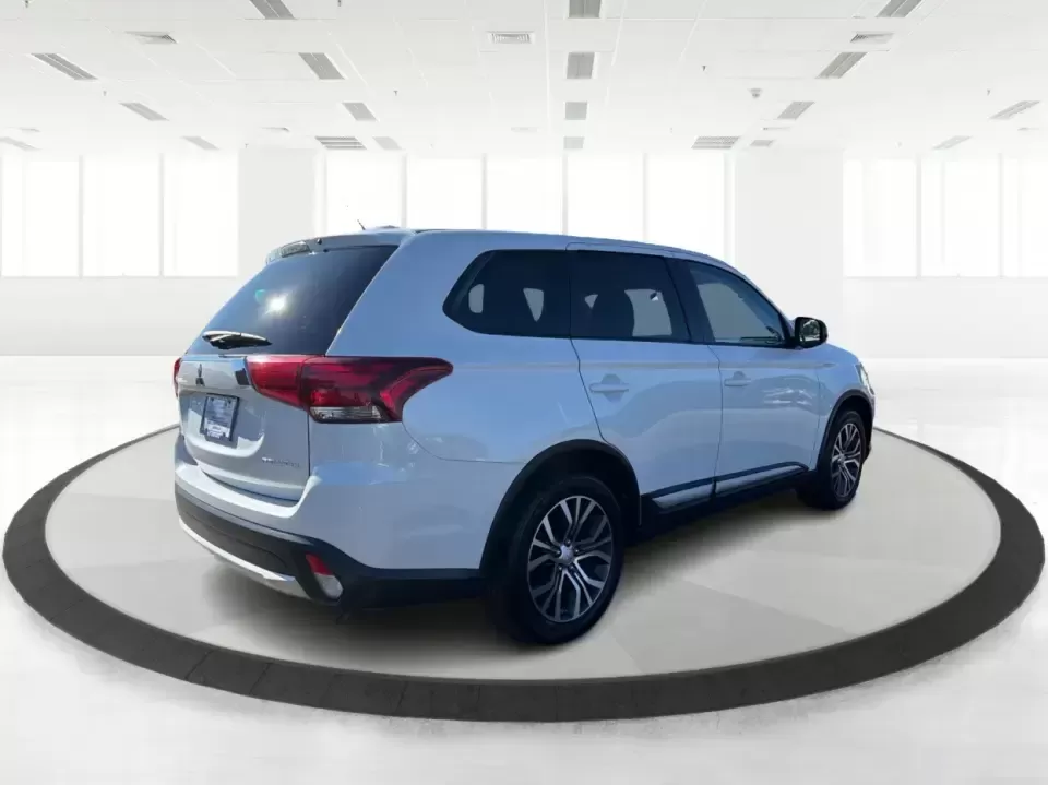 2016 Mitsubishi Outlander ES (JA4AD2A30GZ) with an 2.4L I-4 variable valve control engine, CVT transmission, located at 8750 N County Rd 25A, Piqua, OH, 45356, (937) 908-9800, 40.164391, -84.232513 - Weekend road trips to Indian Lake, daily commutes down I75, or shuttling kids between practice and school-this 2016 Mitsubishi Outlander ES is built for real-life schedules in and around Piqua, Ohio. Finished in Diamond White Pearl, this versatile SUV blends family-friendly space with easy-to-live-w - Photo#2