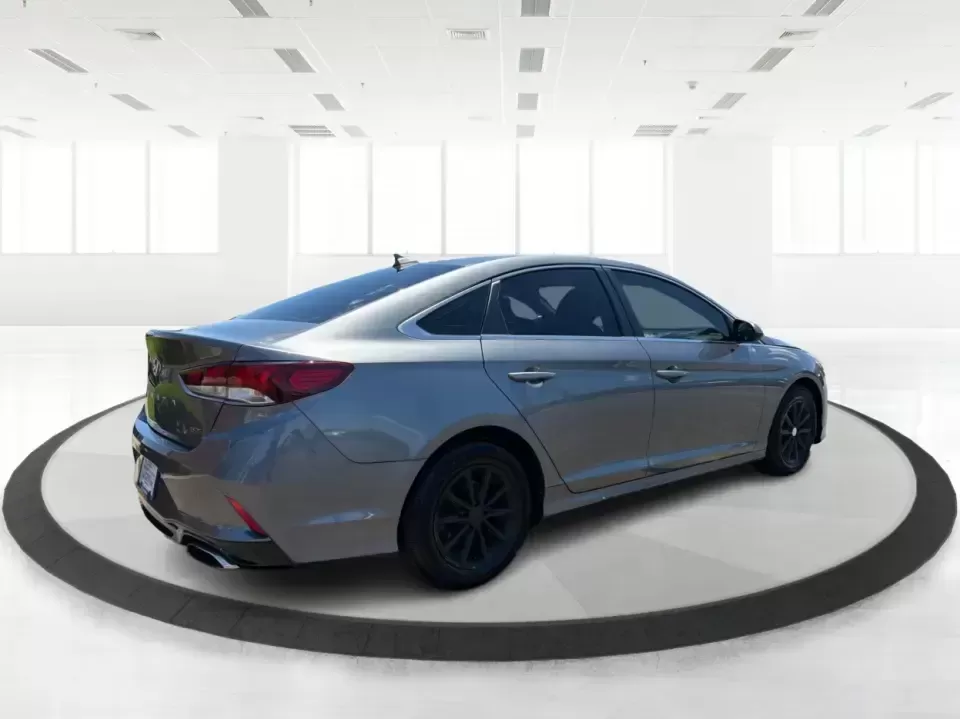 2018 Hyundai Sonata ECO (5NPE24AA3JH) with an 1.6L I-4 gasoline direct injection engine, 7A transmission, located at 1951 S Dayton Lakeview Rd., New Carlisle, OH, 45344, (937) 908-9800, 39.890999, -84.050255 - Need a smart, efficient sedan that can handle a busy weekday commute to Dayton, quick school drop-offs, and the occasional weekend run to Springfield without draining your budget? This 2018 Hyundai Sonata ECO in sleek Machine Gray is an ideal fit for drivers who want comfort, tech, and fuel-friendly - Photo#2