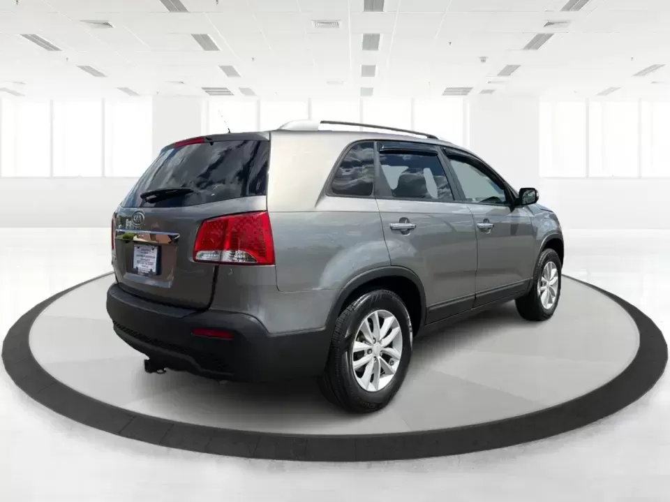 2013 Kia Sorento LX 2WD (5XYKT3A69DG) with an 2.4L L4 DOHC 16V engine, 6-Speed Automatic transmission, located at 8750 N County Rd 25A, Piqua, OH, 45356, (937) 908-9800, 40.164391, -84.232513 - Pack up the kids, load the cooler, and point your weekend plans toward Indian Lake or a quick getaway down I-75-this 2013 Kia Sorento LX 2WD is the kind of practical SUV that fits real life in Piqua. With roomy seating, flexible cargo space, and everyday comfort, it's a smart pick for growing famili - Photo#2
