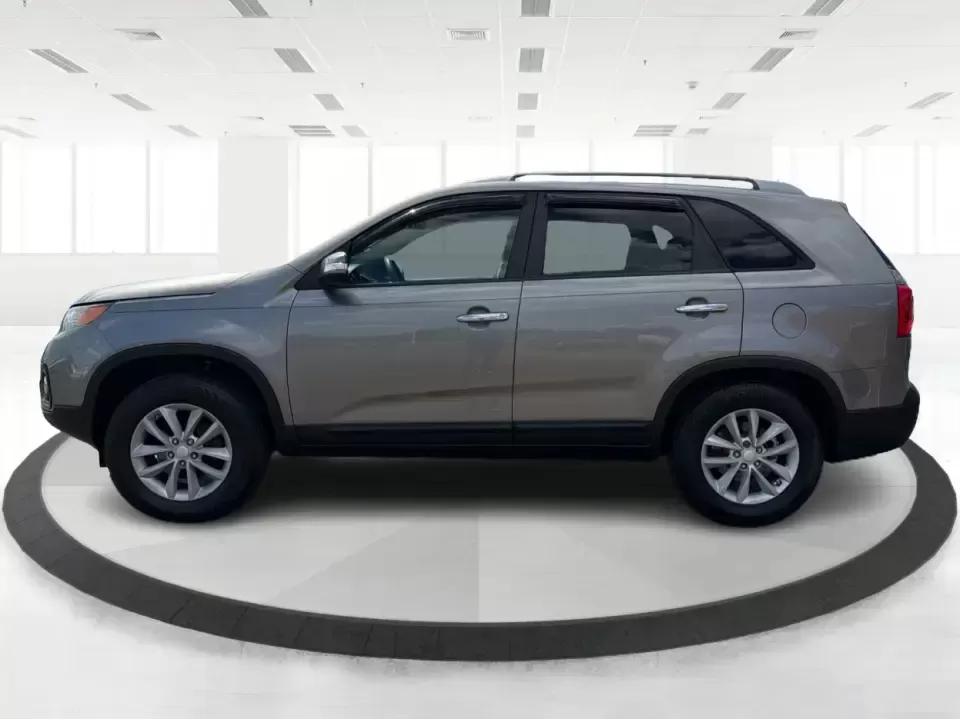 2013 Kia Sorento LX 2WD (5XYKT3A69DG) with an 2.4L L4 DOHC 16V engine, 6-Speed Automatic transmission, located at 8750 N County Rd 25A, Piqua, OH, 45356, (937) 908-9800, 40.164391, -84.232513 - Pack up the kids, load the cooler, and point your weekend plans toward Indian Lake or a quick getaway down I-75-this 2013 Kia Sorento LX 2WD is the kind of practical SUV that fits real life in Piqua. With roomy seating, flexible cargo space, and everyday comfort, it's a smart pick for growing famili - Photo#5