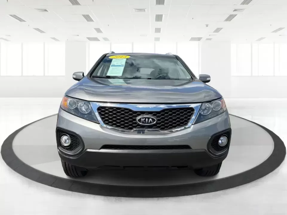2013 Kia Sorento LX 2WD (5XYKT3A69DG) with an 2.4L L4 DOHC 16V engine, 6-Speed Automatic transmission, located at 8750 N County Rd 25A, Piqua, OH, 45356, (937) 908-9800, 40.164391, -84.232513 - Pack up the kids, load the cooler, and point your weekend plans toward Indian Lake or a quick getaway down I-75-this 2013 Kia Sorento LX 2WD is the kind of practical SUV that fits real life in Piqua. With roomy seating, flexible cargo space, and everyday comfort, it's a smart pick for growing famili - Photo#7