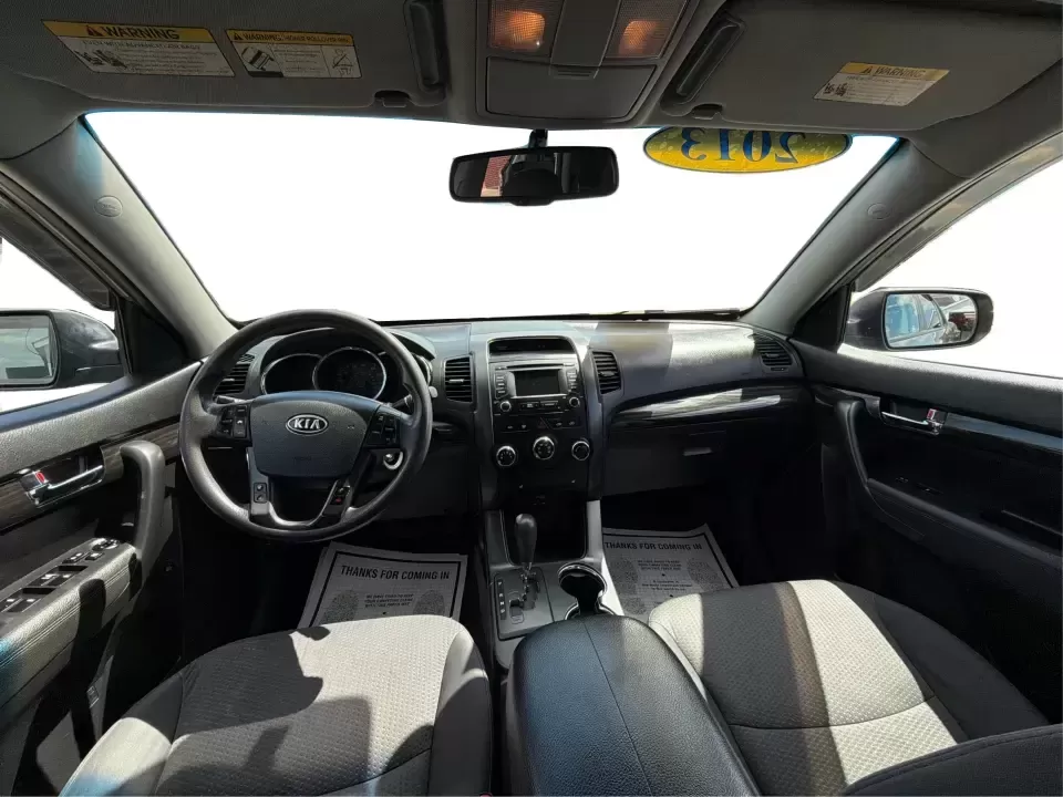 2013 Kia Sorento LX 2WD (5XYKT3A69DG) with an 2.4L L4 DOHC 16V engine, 6-Speed Automatic transmission, located at 8750 N County Rd 25A, Piqua, OH, 45356, (937) 908-9800, 40.164391, -84.232513 - Pack up the kids, load the cooler, and point your weekend plans toward Indian Lake or a quick getaway down I-75-this 2013 Kia Sorento LX 2WD is the kind of practical SUV that fits real life in Piqua. With roomy seating, flexible cargo space, and everyday comfort, it's a smart pick for growing famili - Photo#22