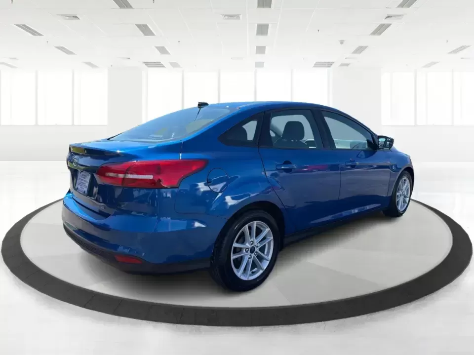 2018 Ford Focus SE (1FADP3F22JL) with an 2.0L L4 DOHC 16V engine, Automatic transmission, located at 4508 South Dixie Dr, Moraine, OH, 45439, (937) 908-9800, 39.689976, -84.218452 - Need a smart, efficient sedan for daily commutes down South Dixie Drive, quick runs to the Moraine Walmart area, or a reliable ride for work in Dayton and back? This 2018 Ford Focus SE is built for real life-easy to park, comfortable for longer drives, and fuel-friendly for the weekly grind. Finishe - Photo#2