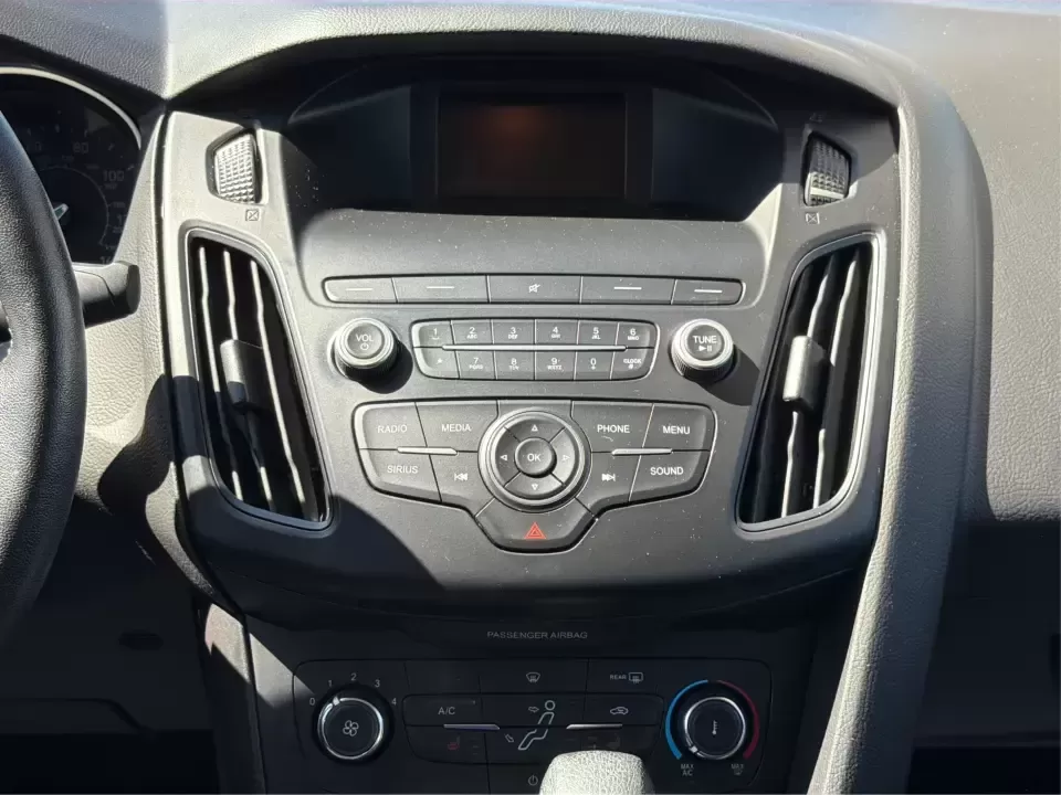 2018 Ford Focus SE (1FADP3F22JL) with an 2.0L L4 DOHC 16V engine, Automatic transmission, located at 4508 South Dixie Dr, Moraine, OH, 45439, (937) 908-9800, 39.689976, -84.218452 - Need a smart, efficient sedan for daily commutes down South Dixie Drive, quick runs to the Moraine Walmart area, or a reliable ride for work in Dayton and back? This 2018 Ford Focus SE is built for real life-easy to park, comfortable for longer drives, and fuel-friendly for the weekly grind. Finishe - Photo#13