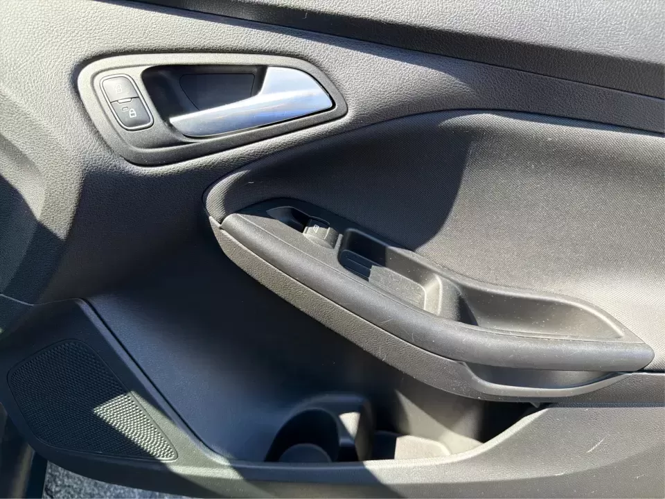 2018 Ford Focus SE (1FADP3F22JL) with an 2.0L L4 DOHC 16V engine, Automatic transmission, located at 4508 South Dixie Dr, Moraine, OH, 45439, (937) 908-9800, 39.689976, -84.218452 - Need a smart, efficient sedan for daily commutes down South Dixie Drive, quick runs to the Moraine Walmart area, or a reliable ride for work in Dayton and back? This 2018 Ford Focus SE is built for real life-easy to park, comfortable for longer drives, and fuel-friendly for the weekly grind. Finishe - Photo#19