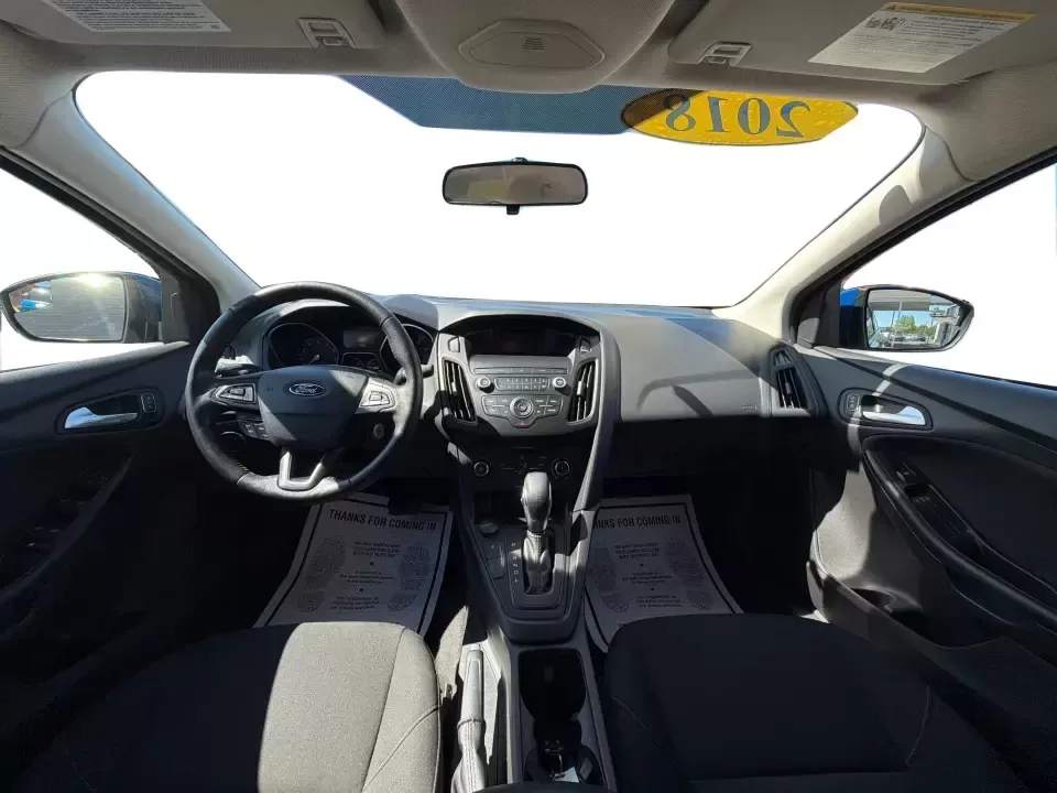 2018 Ford Focus SE (1FADP3F22JL) with an 2.0L L4 DOHC 16V engine, Automatic transmission, located at 4508 South Dixie Dr, Moraine, OH, 45439, (937) 908-9800, 39.689976, -84.218452 - Need a smart, efficient sedan for daily commutes down South Dixie Drive, quick runs to the Moraine Walmart area, or a reliable ride for work in Dayton and back? This 2018 Ford Focus SE is built for real life-easy to park, comfortable for longer drives, and fuel-friendly for the weekly grind. Finishe - Photo#20