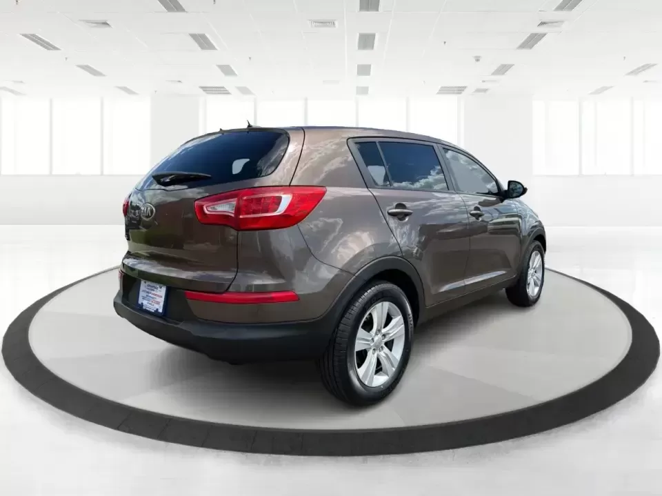 2013 Kia Sportage LX (KNDPBCA27D7) with an 2.4L I-4 DOHC engine, 6-Speed Automatic transmission, located at 1099 N County Rd 25A , Troy, OH, 45373, (937) 908-9800, 40.057079, -84.212883 - Pack up for a weekend at Troy Community Park, tackle a snowy school run, or cruise I75 for your daily commute-this 2013 Kia Sportage LX is the kind of compact SUV that fits real life in West Central Ohio. With its versatile crossover size, confident AWD capability, and practical cargo space, it's a - Photo#2