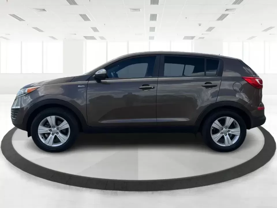 2013 Kia Sportage LX (KNDPBCA27D7) with an 2.4L I-4 DOHC engine, 6-Speed Automatic transmission, located at 1099 N County Rd 25A , Troy, OH, 45373, (937) 908-9800, 40.057079, -84.212883 - Pack up for a weekend at Troy Community Park, tackle a snowy school run, or cruise I75 for your daily commute-this 2013 Kia Sportage LX is the kind of compact SUV that fits real life in West Central Ohio. With its versatile crossover size, confident AWD capability, and practical cargo space, it's a - Photo#5