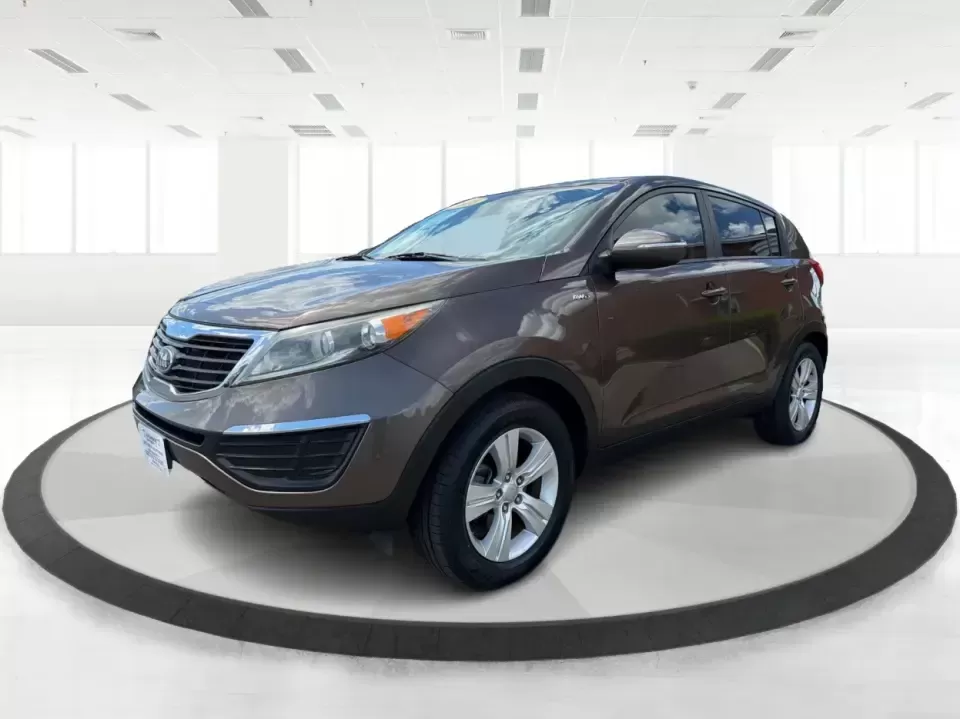 2013 Kia Sportage LX (KNDPBCA27D7) with an 2.4L I-4 DOHC engine, 6-Speed Automatic transmission, located at 1099 N County Rd 25A , Troy, OH, 45373, (937) 908-9800, 40.057079, -84.212883 - Pack up for a weekend at Troy Community Park, tackle a snowy school run, or cruise I75 for your daily commute-this 2013 Kia Sportage LX is the kind of compact SUV that fits real life in West Central Ohio. With its versatile crossover size, confident AWD capability, and practical cargo space, it's a - Photo#8