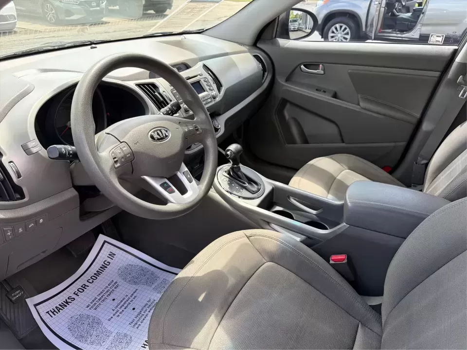 2013 Kia Sportage LX (KNDPBCA27D7) with an 2.4L I-4 DOHC engine, 6-Speed Automatic transmission, located at 1099 N County Rd 25A , Troy, OH, 45373, (937) 908-9800, 40.057079, -84.212883 - Pack up for a weekend at Troy Community Park, tackle a snowy school run, or cruise I75 for your daily commute-this 2013 Kia Sportage LX is the kind of compact SUV that fits real life in West Central Ohio. With its versatile crossover size, confident AWD capability, and practical cargo space, it's a - Photo#9