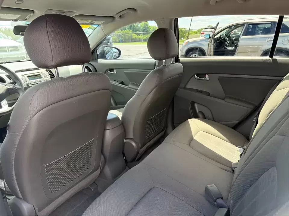 2013 Kia Sportage LX (KNDPBCA27D7) with an 2.4L I-4 DOHC engine, 6-Speed Automatic transmission, located at 1099 N County Rd 25A , Troy, OH, 45373, (937) 908-9800, 40.057079, -84.212883 - Pack up for a weekend at Troy Community Park, tackle a snowy school run, or cruise I75 for your daily commute-this 2013 Kia Sportage LX is the kind of compact SUV that fits real life in West Central Ohio. With its versatile crossover size, confident AWD capability, and practical cargo space, it's a - Photo#10