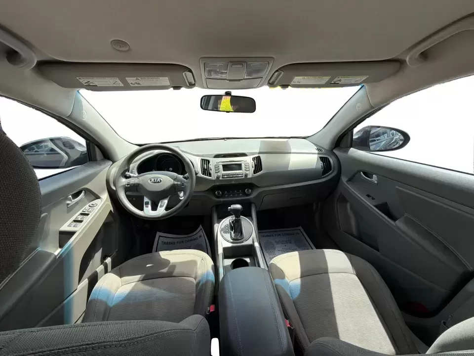 2013 Kia Sportage LX (KNDPBCA27D7) with an 2.4L I-4 DOHC engine, 6-Speed Automatic transmission, located at 1099 N County Rd 25A , Troy, OH, 45373, (937) 908-9800, 40.057079, -84.212883 - Pack up for a weekend at Troy Community Park, tackle a snowy school run, or cruise I75 for your daily commute-this 2013 Kia Sportage LX is the kind of compact SUV that fits real life in West Central Ohio. With its versatile crossover size, confident AWD capability, and practical cargo space, it's a - Photo#21