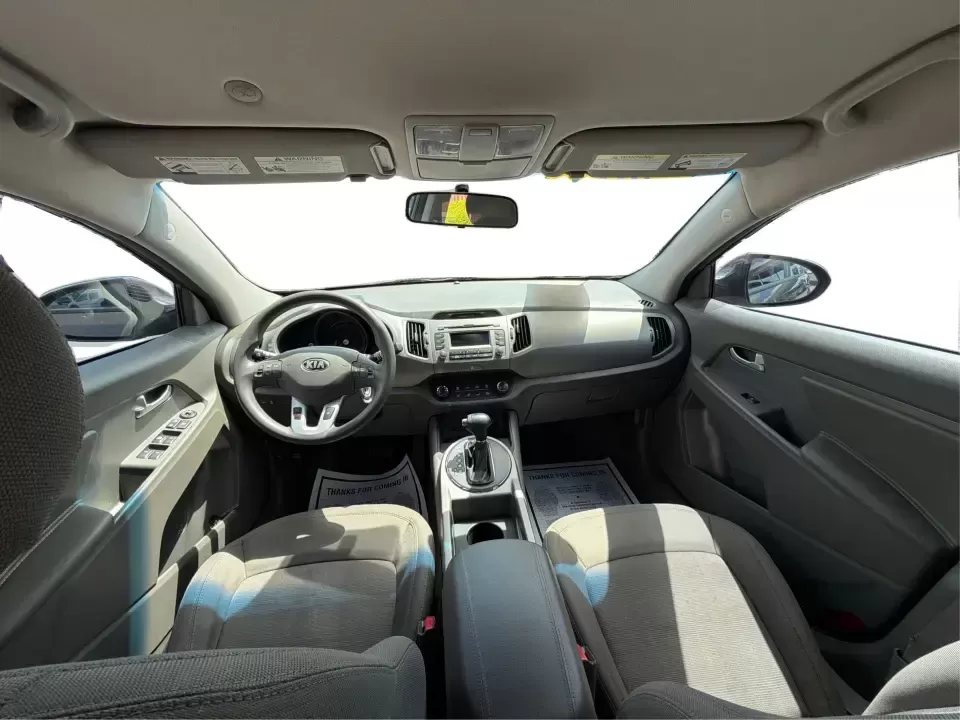 2013 Kia Sportage LX (KNDPBCA27D7) with an 2.4L I-4 DOHC engine, 6-Speed Automatic transmission, located at 1099 N County Rd 25A , Troy, OH, 45373, (937) 908-9800, 40.057079, -84.212883 - Pack up for a weekend at Troy Community Park, tackle a snowy school run, or cruise I75 for your daily commute-this 2013 Kia Sportage LX is the kind of compact SUV that fits real life in West Central Ohio. With its versatile crossover size, confident AWD capability, and practical cargo space, it's a - Photo#22