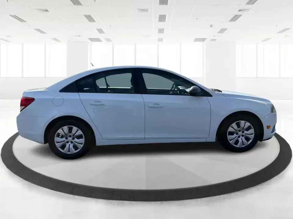 2014 Chevrolet Cruze LS Auto (1G1PA5SG0E7) with an ECOTEC 1.8L I-4 DOHC engine, 6-Speed Automatic transmission, located at 401 Woodman Dr, Riverside, OH, 45431, (937) 908-9800, 39.760899, -84.123421 - Picture your next week in Riverside: an easy I675 commute to Wright-Patterson AFB, quick grocery runs near Airway Shopping Center, and a comfortable weekend drive down Woodman Dr toward Downtown Dayton-without stretching your budget. This 2014 Chevrolet Cruze LS Auto is a smart, practical sedan for - Photo#1
