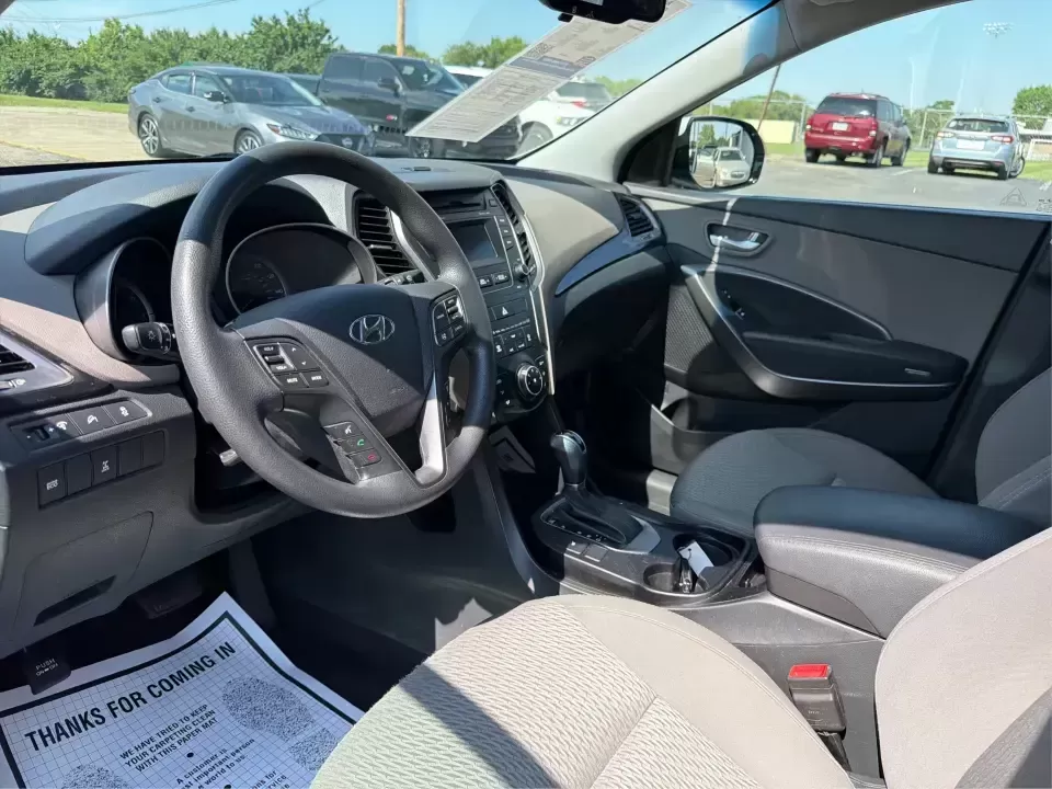 2016 Hyundai Santa Fe SE (KM8SMDHF5GU) with an 3.3L V-6 gasoline direct injection engine, 6A transmission, located at 1184 Kauffman Ave, Fairborn, OH, 45324, (937) 908-9800, 39.807072, -84.030914 - Whether you're hauling kids to practice, commuting to Wright-Patterson AFB, or packing up for a weekend getaway to John Bryan State Park, this 2016 Hyundai Santa Fe SE is built for real-life Ohio schedules. With three-row versatility, confident traction for changing weather, and comfort features tha - Photo#9