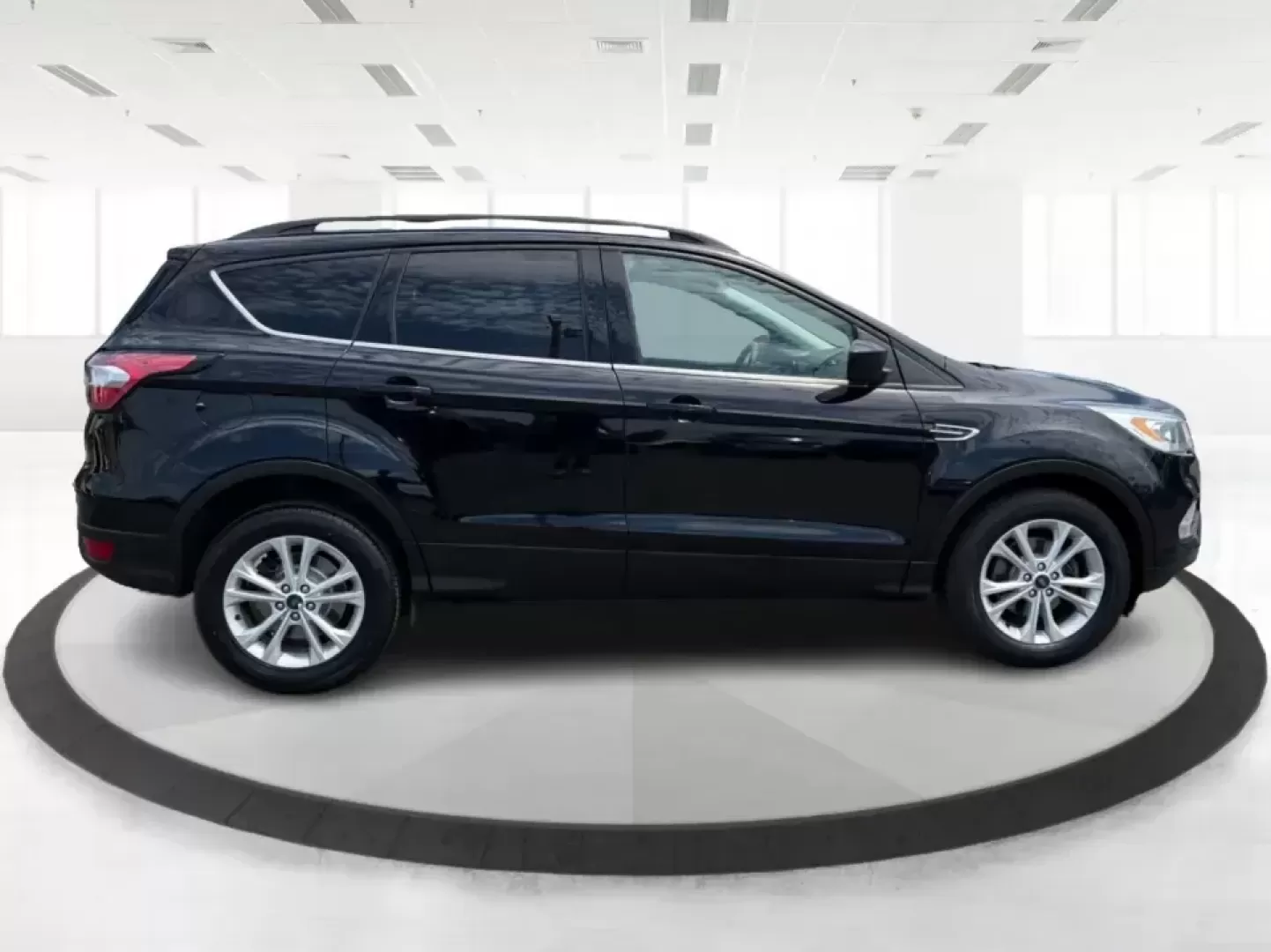 2017 Ford Escape SE FWD (1FMCU0GD1HU) with an 1.5L L4 DOHC 16V engine, 6A transmission, located at 880 E. National Road, Vandalia, OH, 45377, (937) 908-9800, 39.891918, -84.183594 - Picture your next week: a smooth commute down I75, a quick run to the Dayton Mall, and a weekend getaway with room for groceries, gear, and friends-all in one easy-to-drive SUV. This 2017 Ford Escape SE in Shadow Black is a smart fit for busy families, first-time buyers, and anyone who wants a pract - Photo#1