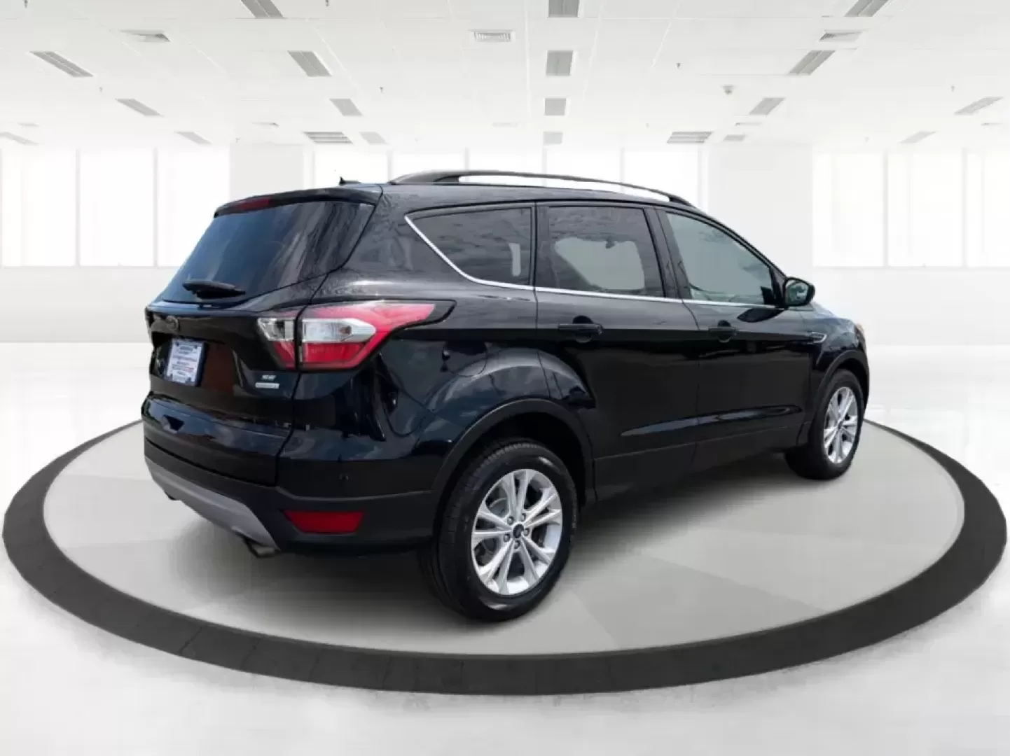 2017 Ford Escape SE FWD (1FMCU0GD1HU) with an 1.5L L4 DOHC 16V engine, 6A transmission, located at 880 E. National Road, Vandalia, OH, 45377, (937) 908-9800, 39.891918, -84.183594 - Picture your next week: a smooth commute down I75, a quick run to the Dayton Mall, and a weekend getaway with room for groceries, gear, and friends-all in one easy-to-drive SUV. This 2017 Ford Escape SE in Shadow Black is a smart fit for busy families, first-time buyers, and anyone who wants a pract - Photo#2