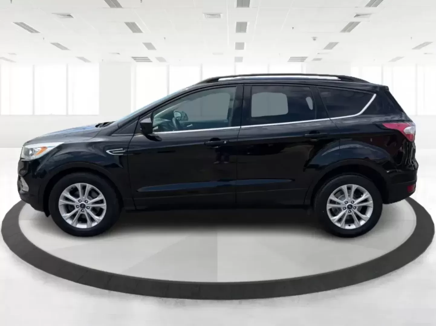 2017 Ford Escape SE FWD (1FMCU0GD1HU) with an 1.5L L4 DOHC 16V engine, 6A transmission, located at 880 E. National Road, Vandalia, OH, 45377, (937) 908-9800, 39.891918, -84.183594 - Picture your next week: a smooth commute down I75, a quick run to the Dayton Mall, and a weekend getaway with room for groceries, gear, and friends-all in one easy-to-drive SUV. This 2017 Ford Escape SE in Shadow Black is a smart fit for busy families, first-time buyers, and anyone who wants a pract - Photo#5